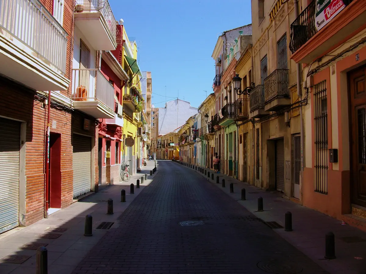 Carrer del Rosari in the Cabanyal, a narrow street of colourful old houses with balconies